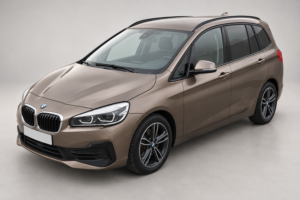Бежевый BMW Gran Tourer с рейлингами, вид спереди и сбоку.